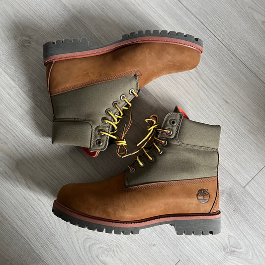 Timberland Heritage 6-Inch Waterproof Boots in brown and khaki. Built for warmth, durability, and everyday wear with waterproof premium leather, PrimaLoft® insulation, and TimberDry™ waterproof technology. Includes a cushioned anti-fatigue footbed, padded collar, and steel shank for superior comfort and support. A timeless essential made for all conditions.