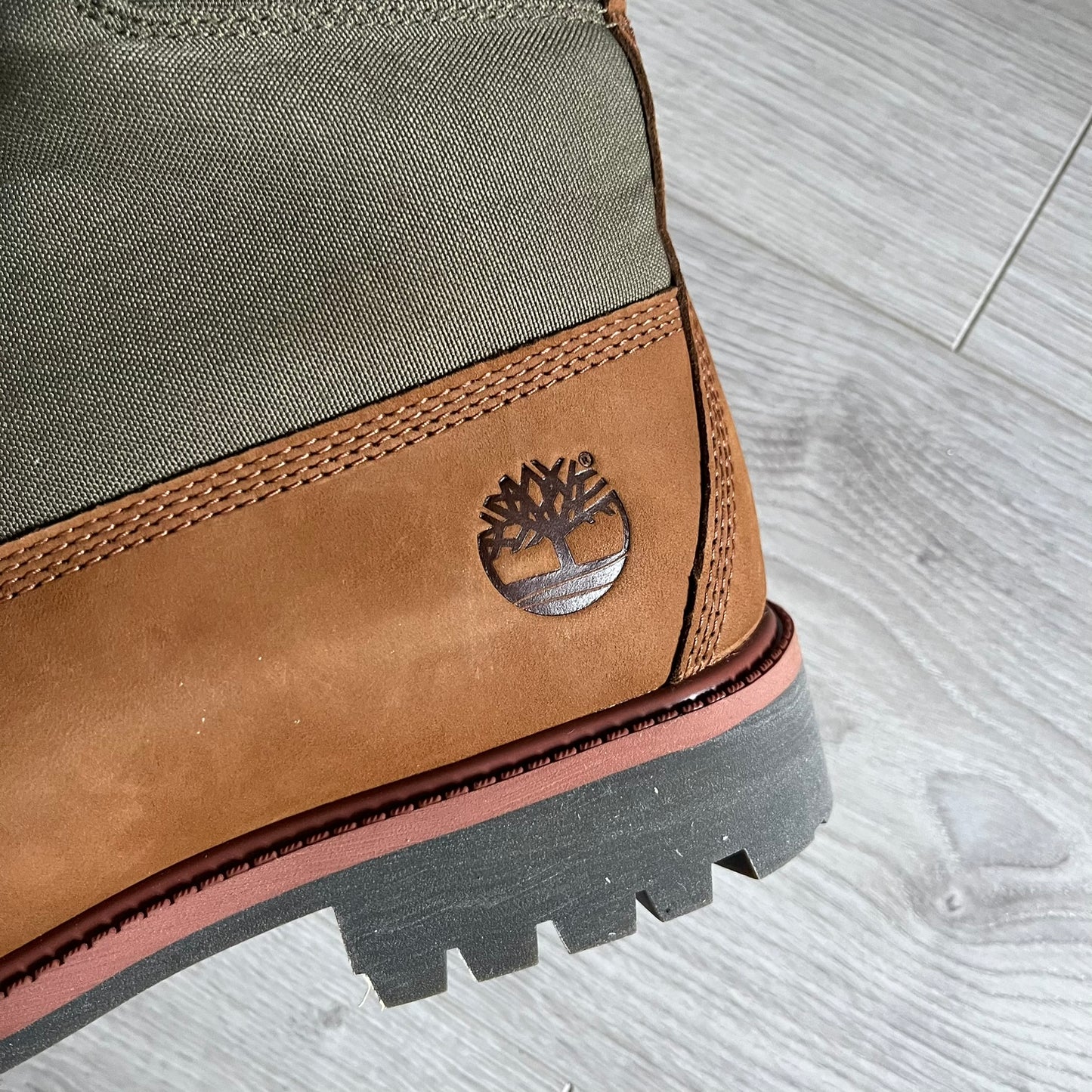 Timberland Heritage 6-Inch Waterproof Boots in brown and khaki. Built for warmth, durability, and everyday wear with waterproof premium leather, PrimaLoft® insulation, and TimberDry™ waterproof technology. Includes a cushioned anti-fatigue footbed, padded collar, and steel shank for superior comfort and support. A timeless essential made for all conditions.