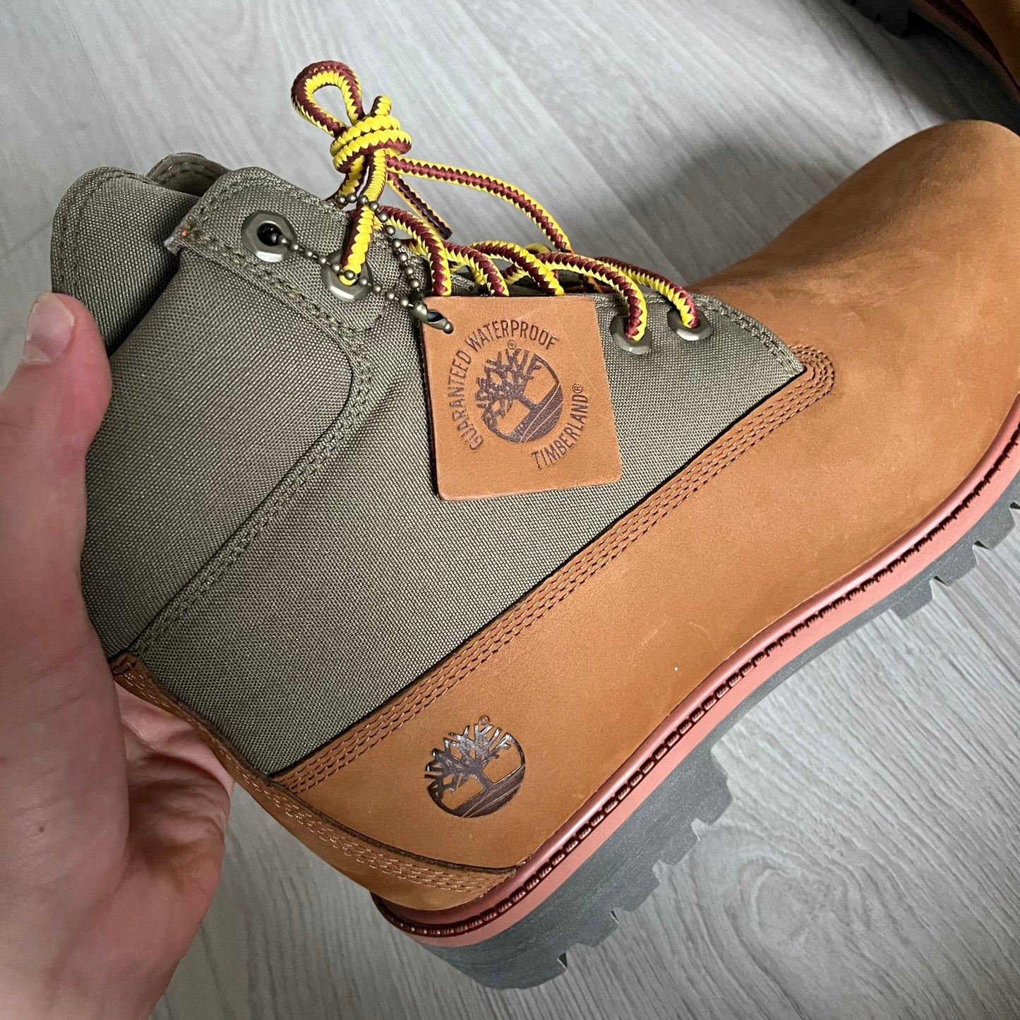Timberland Heritage 6-Inch Waterproof Boots in brown and khaki. Built for warmth, durability, and everyday wear with waterproof premium leather, PrimaLoft® insulation, and TimberDry™ waterproof technology. Includes a cushioned anti-fatigue footbed, padded collar, and steel shank for superior comfort and support. A timeless essential made for all conditions.