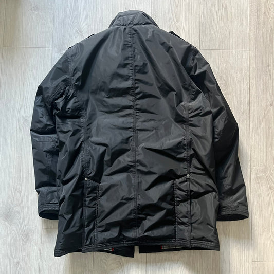 The Wellensteyn Mercury Black Winter Jacket combines premium function with tailored elegance. Crafted from TiSaAirTec fabric, it offers a smooth, matte finish that is waterproof, windproof, and built for temperatures from 0 to -20 °C. Features include a removable inner jacket with a high knit collar, multiple secure pockets, back vents, and a quilted lining for warmth. A signature of German engineering and timeless outerwear design.