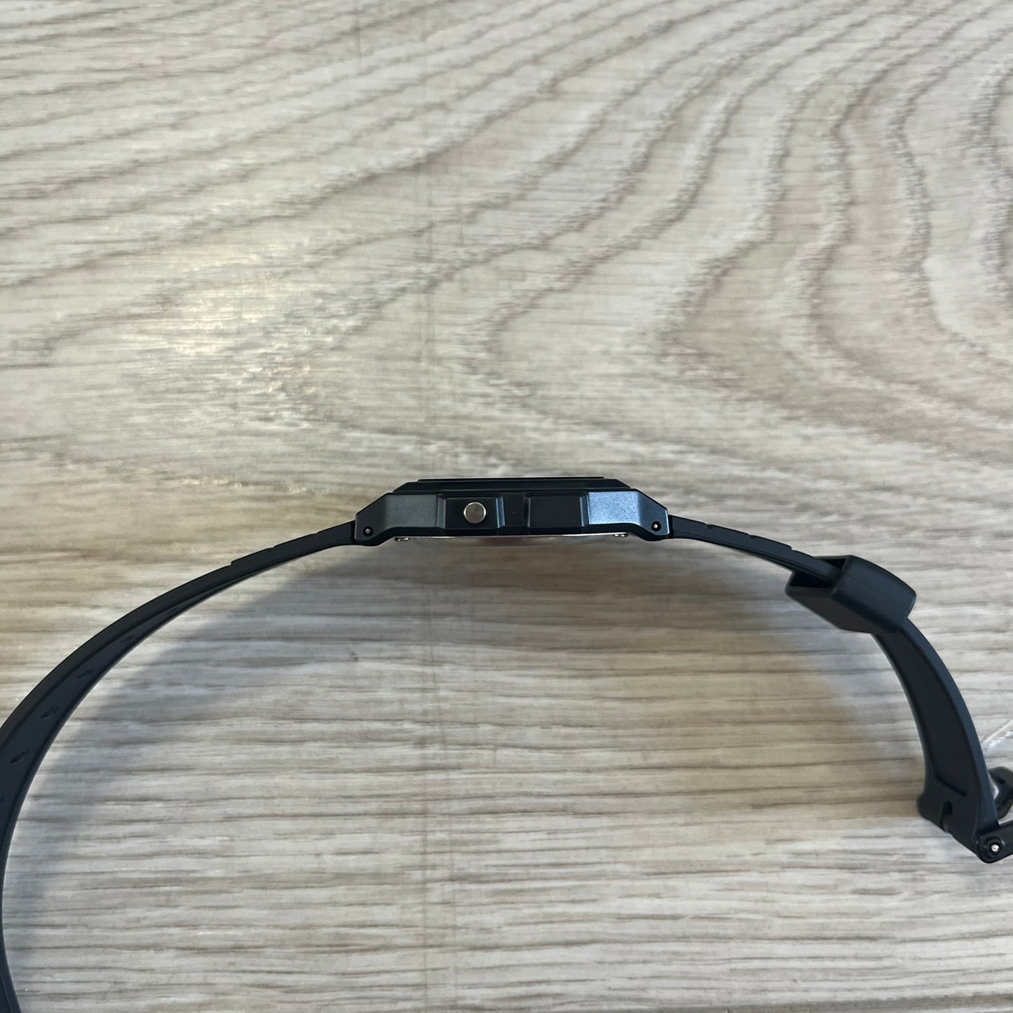Black headband on a wooden surface