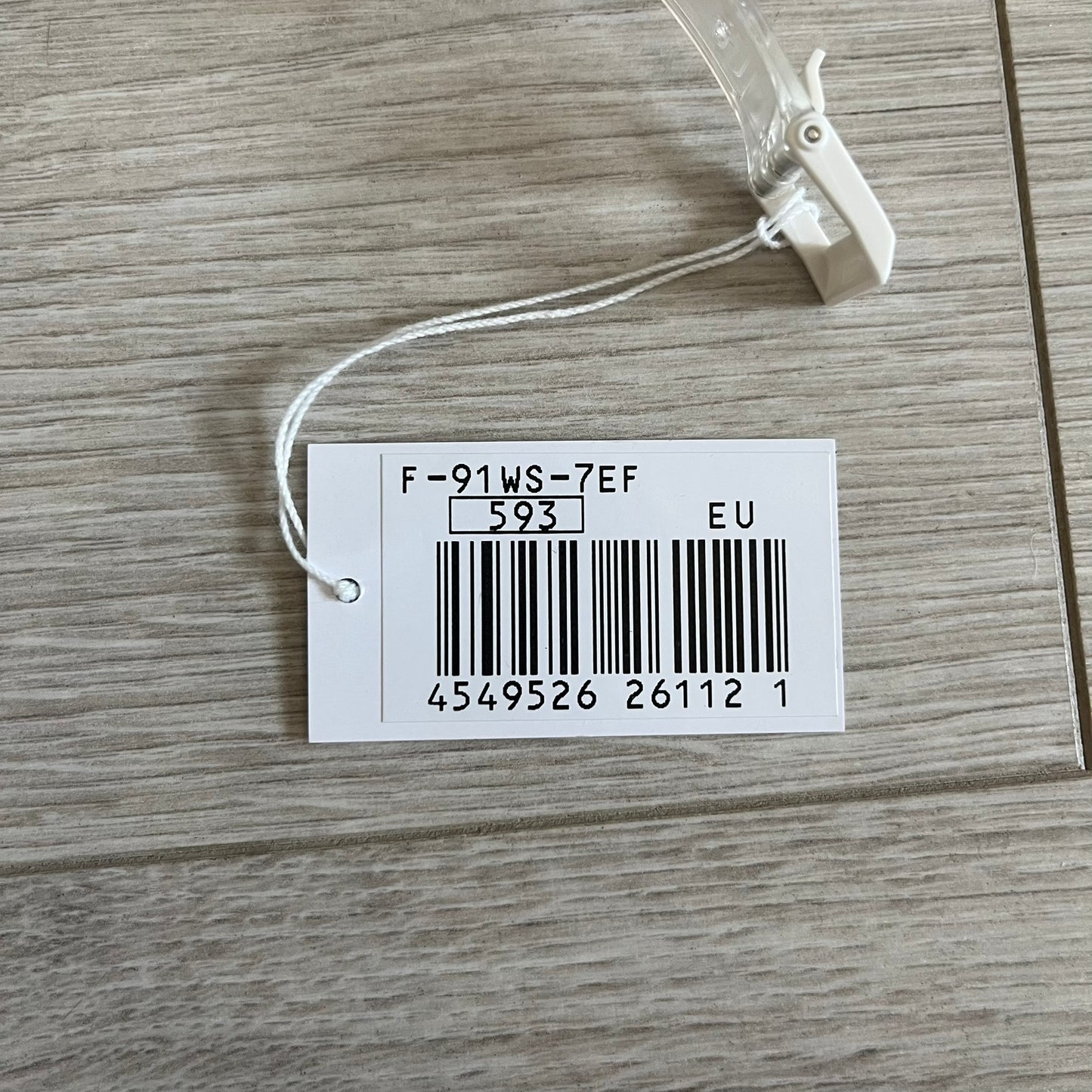 Barcode label on a wooden surface