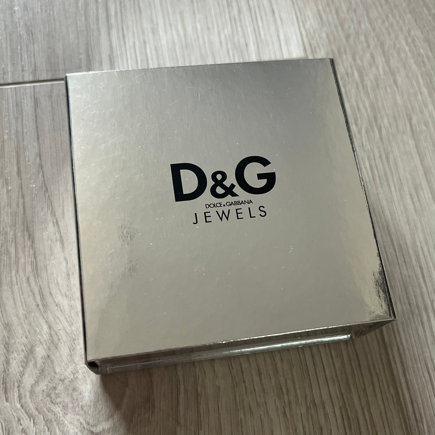 Dolce & Gabbana jewelry box on a wooden surface