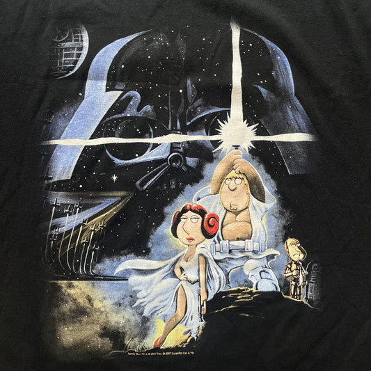 Black t-shirt with a Star Wars-themed design featuring characters and the Death Star.