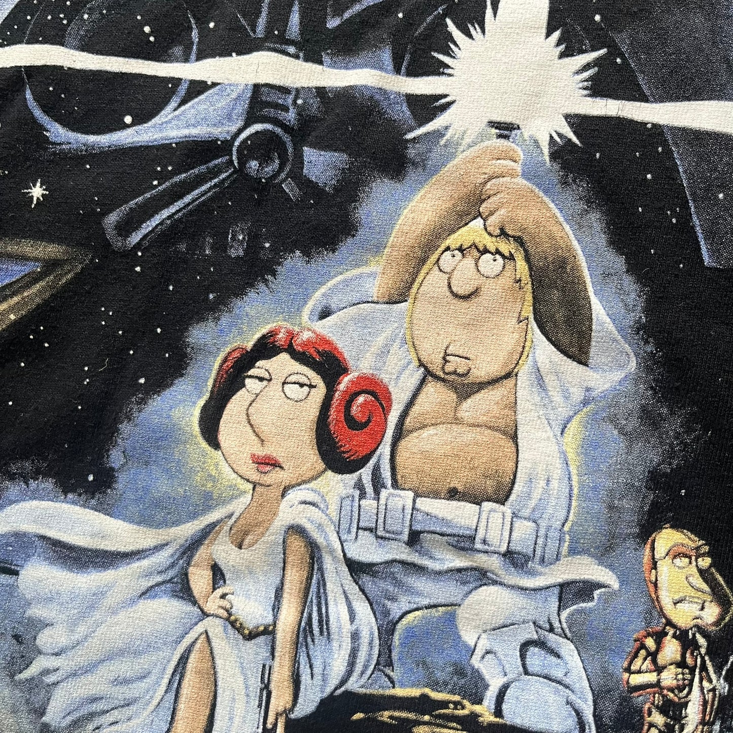 Cartoon characters in a space-themed setting with a spaceship and stars in the background.