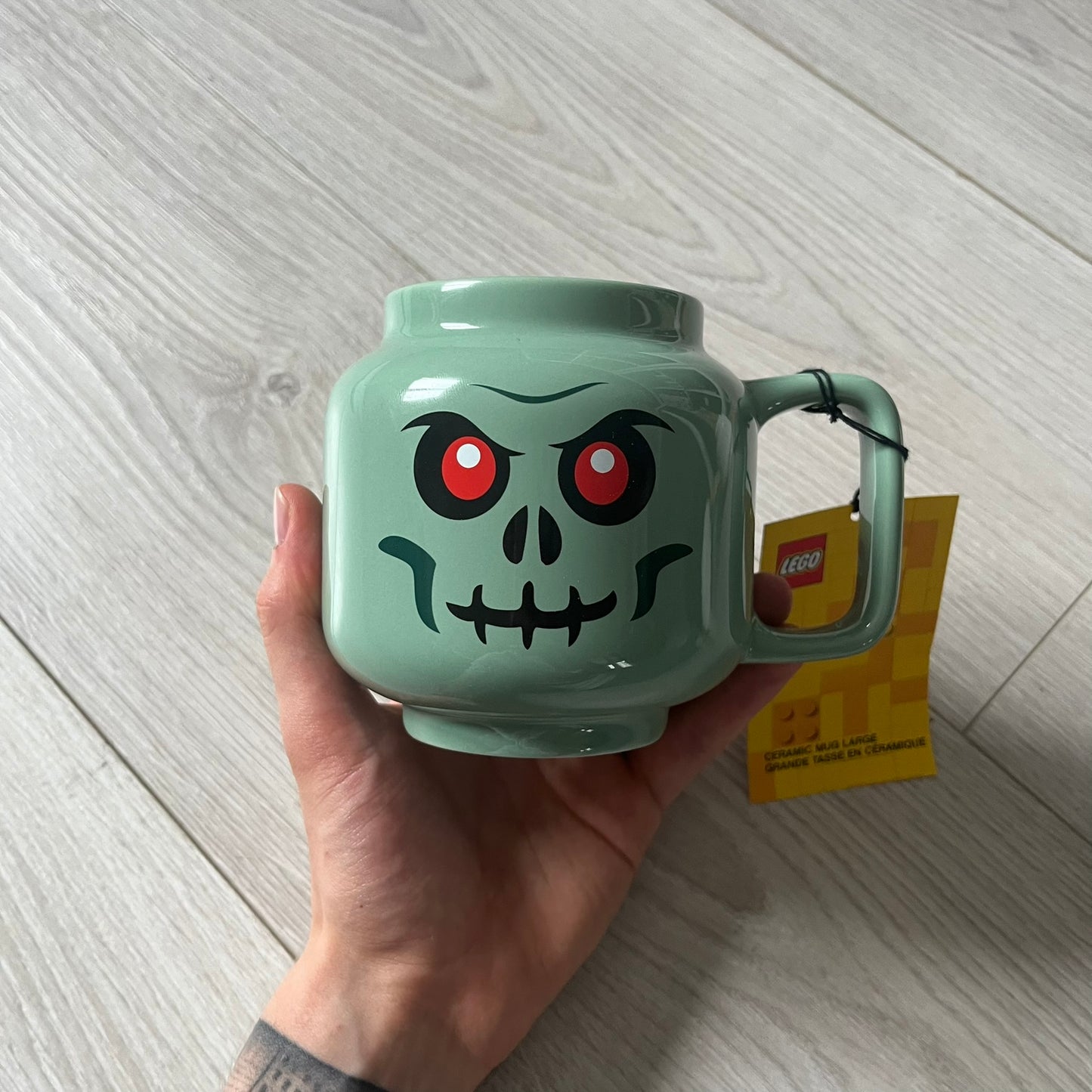 large lego green skeleton ceramic mug