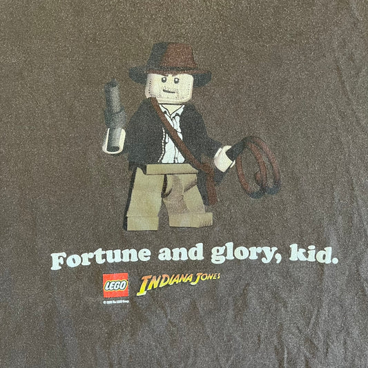 LEGO Indiana Jones figure with text 'Fortune and glory, kid.' on a dark background