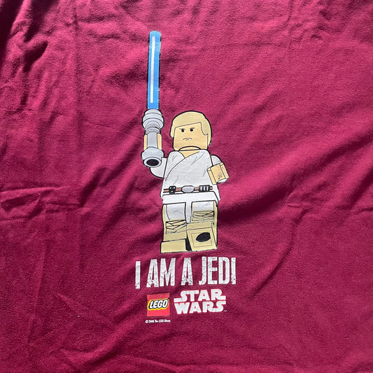 Maroon t-shirt with a LEGO Star Wars character and text on a maroon background