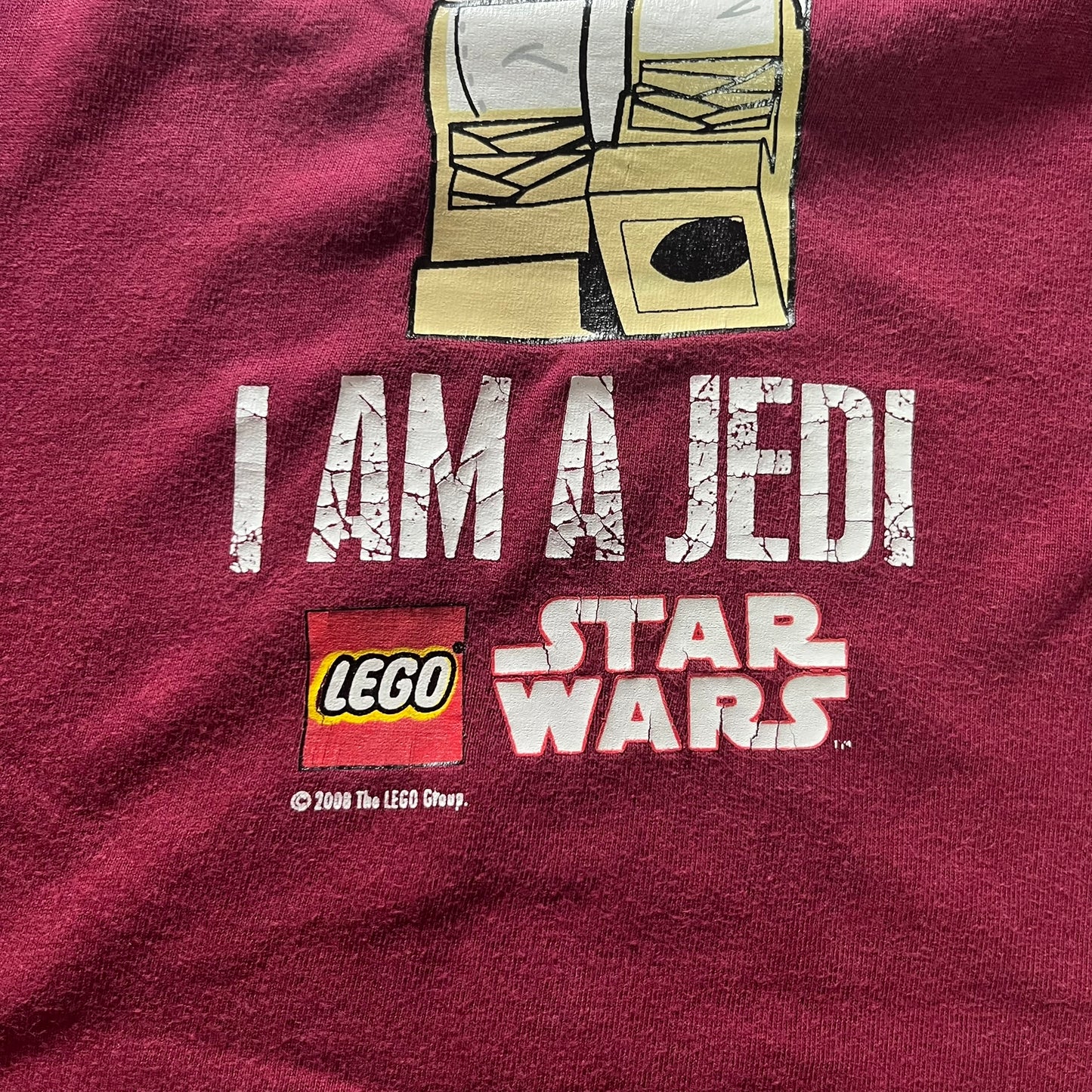 Maroon t-shirt with 'I AM A JEDI' and LEGO Star Wars text, tag visible.
