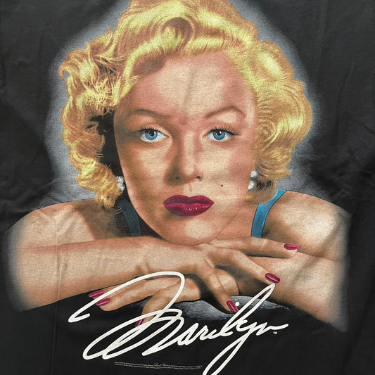 Illustration of a famous actress with signature on a black background