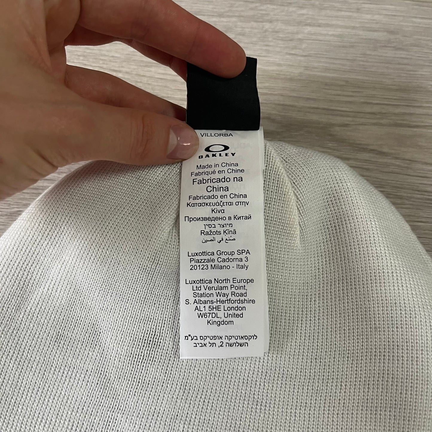 Oakley brand label on a product with a blurred background