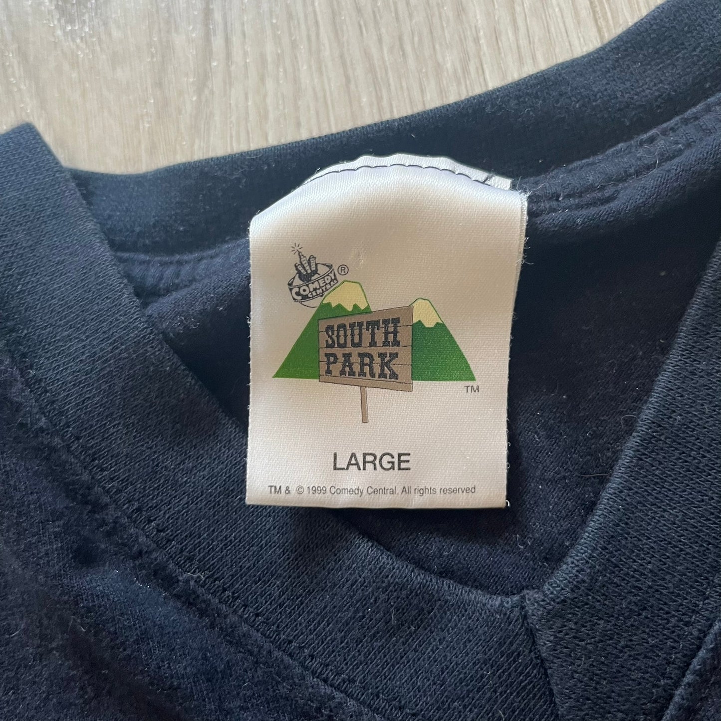 South Park label on a navy blue shirt