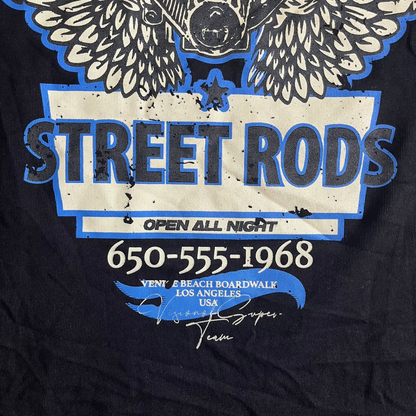 Black t-shirt with 'Street Rods' graphic design featuring an eagle and contact information.