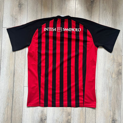 AC Milan Academy x Dolce &amp; Gabbana 2008/09 Home Tee is a black and red striped football shirt with black short sleeves. The chest features AC Milan Academy and Dolce &amp; Gabbana Junior logos on the sides, and a adidas logo in the center. Made with Clima365 technology.