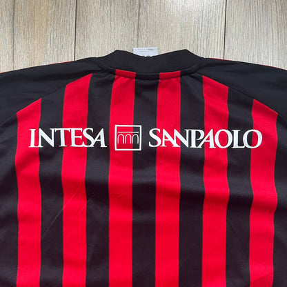 AC Milan Academy x Dolce &amp; Gabbana 2008/09 Home Tee is a black and red striped football shirt with black short sleeves. The chest features AC Milan Academy and Dolce &amp; Gabbana Junior logos on the sides, and a adidas logo in the center. Made with Clima365 technology.