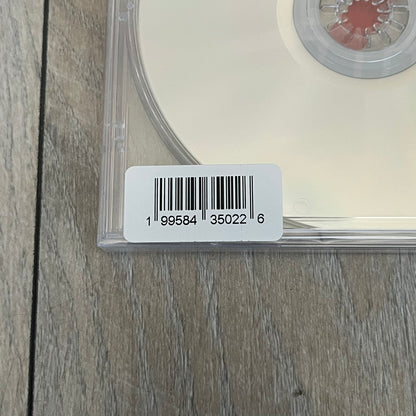 A$AP Rocky “Don’t Be Dumb” GRIM CD is a jewel case CD release of Don’t Be Dumb by A$AP Rocky featuring DUMMY artwork by Tim Burton. The cover includes large “Don’t Be Dumb” text with smaller “A$AP Rocky” and “Tim Burton Presents” above, along with the Dummy figure in a Dummy mask. The case spine features “Don’t Be Dumb” text, and the disc includes a foil design with a red crossed-out circle graphic.