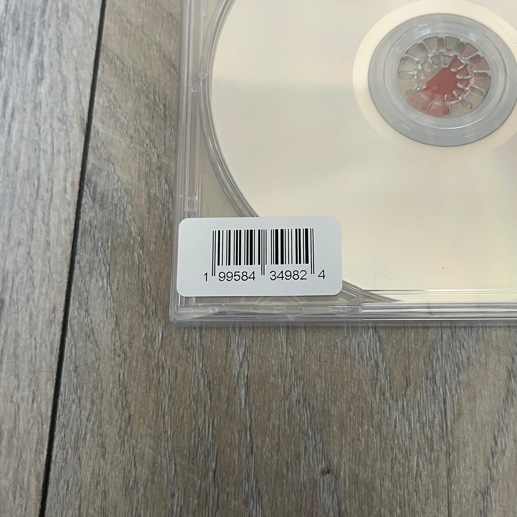 A$AP Rocky “Don’t Be Dumb” GRIM CD is a jewel case CD release of Don’t Be Dumb by A$AP Rocky featuring GRIM artwork by Tim Burton. The cover includes large “Don’t Be Dumb” text with smaller “A$AP Rocky” and “Tim Burton Presents” above, along with the GRIM figure holding a megaphone. The case spine features “Don’t Be Dumb” text, and the disc includes a foil design with a red crossed-out circle graphic.