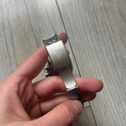 Adidas Adi-Star Pro Chrono ADP-1017 Analog Watch is a stainless steel timepiece with a white dial featuring the Adidas logo and three subdials for chronograph functions. It has two side buttons and a crown for adjustments, with a detailed and textured dial design. The watch is water resistant up to 200 meters.