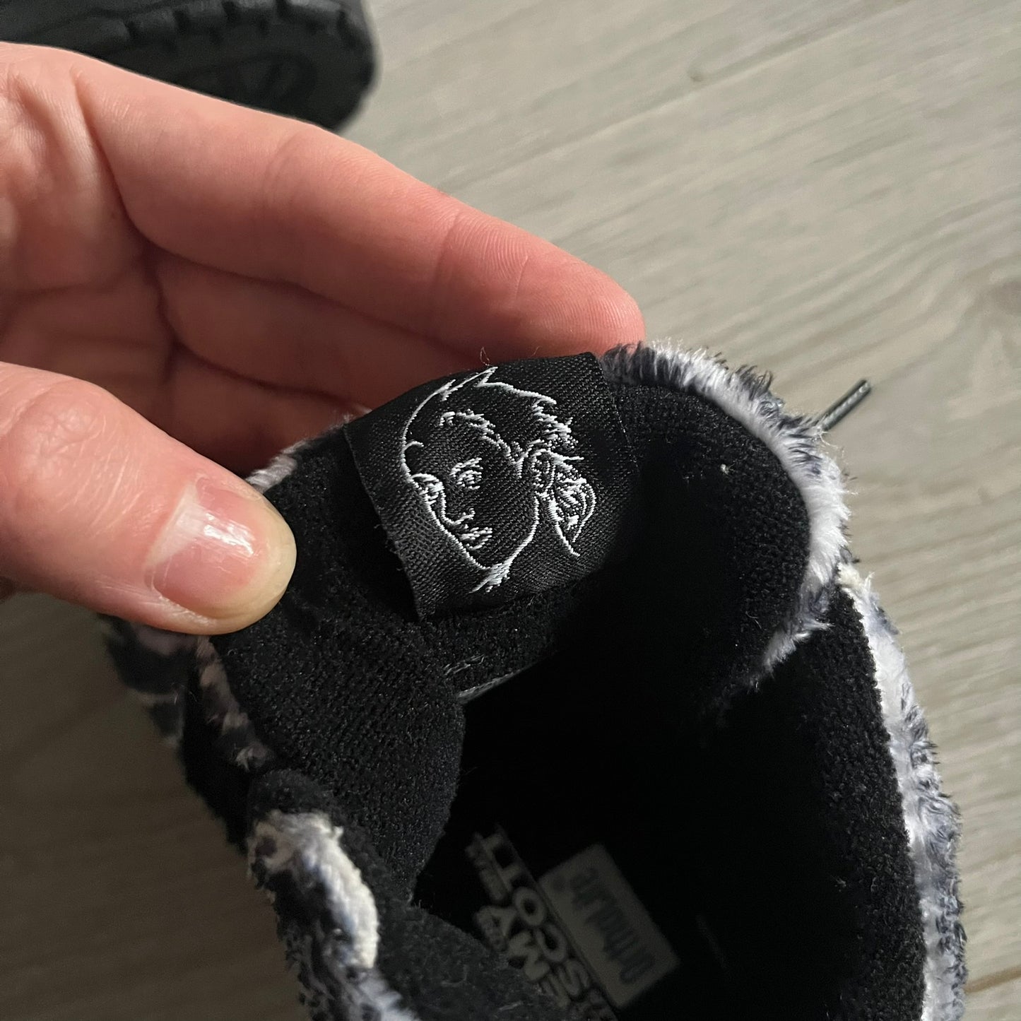 Adidas Jeremy Scott Zebra Black &amp; White Sneakers - Sample pair, Style G95749. High-top sneakers featuring black and white faux-fur zebra print, a 3D tail at the heel, rubber soles, and front lace closure. From the FW13 Jeremy Scott for Adidas collection, these iconic sneakers combine classic adidas design with signature crazy JS styling.