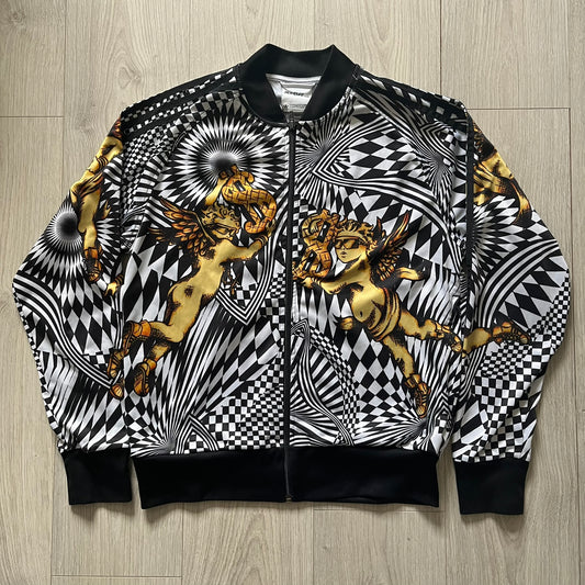 Bomber jacket with gold panther design on a wooden floor