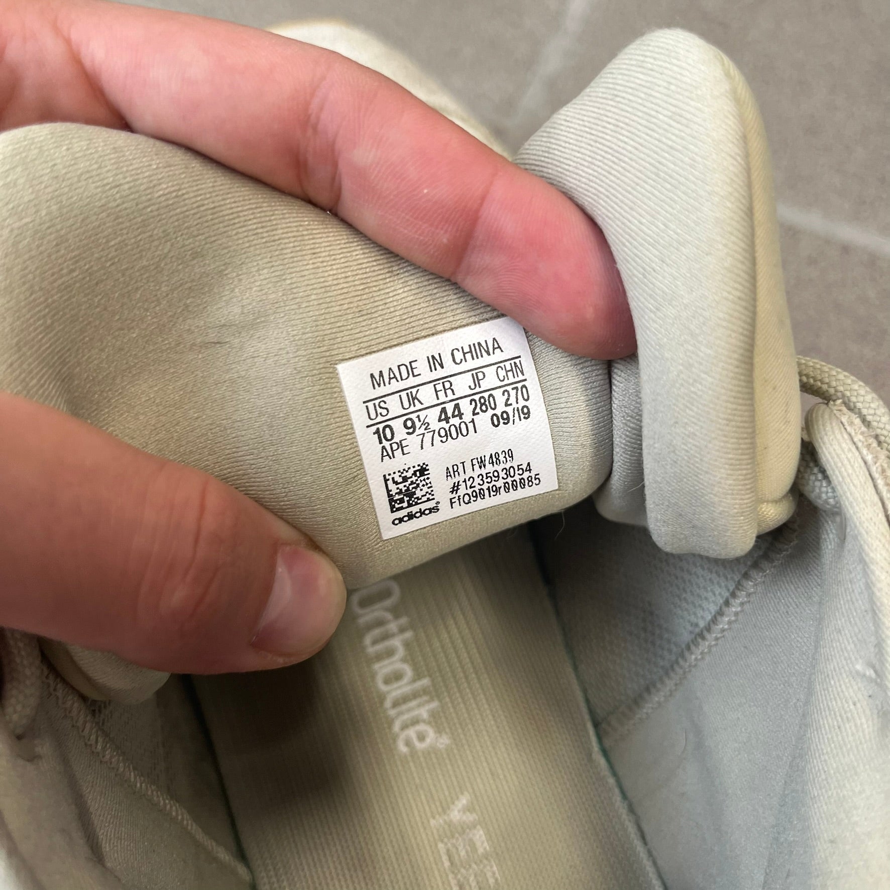 Adidas Yeezy 500 “Stone” Sneakers feature a Stone/Stone/Stone colorway with suede and neoprene paneling, reflective piping, and a pull-tab at the tongue. The sneakers have a lace-up fastening, adiPRENE midsole, and gum rubber outsole. Style FW4839, released November 23, 2019.
