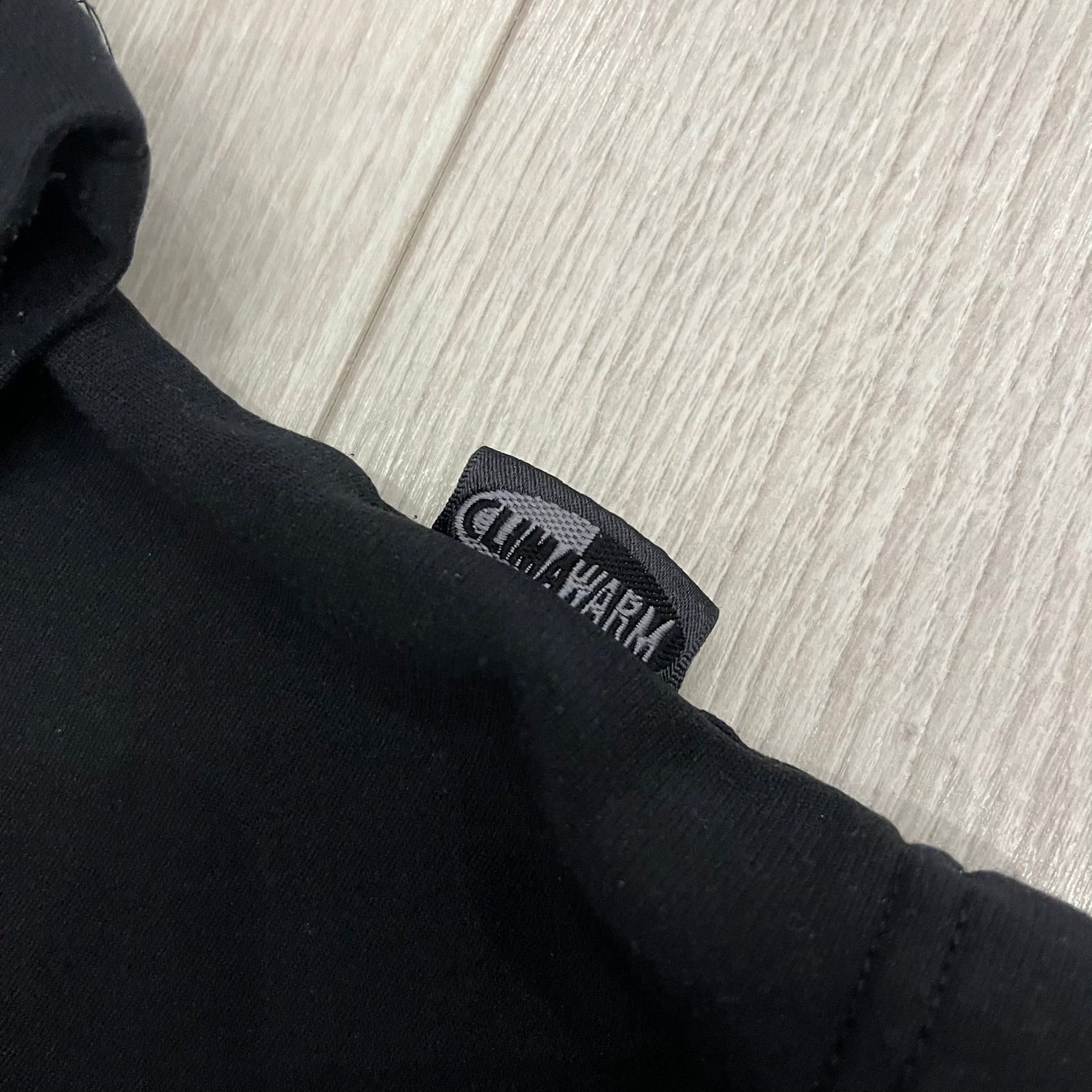 Adidas 2004/05 Germany Longsleeve in black featuring the Talent Förderung logo on the front and a center Adidas chest logo. Designed with classic three white stripes along the wrists and multiple sponsor logos on the back, including Mercedes, Adidas, and Nintendo. Made with Climawear fabric for comfort and performance.