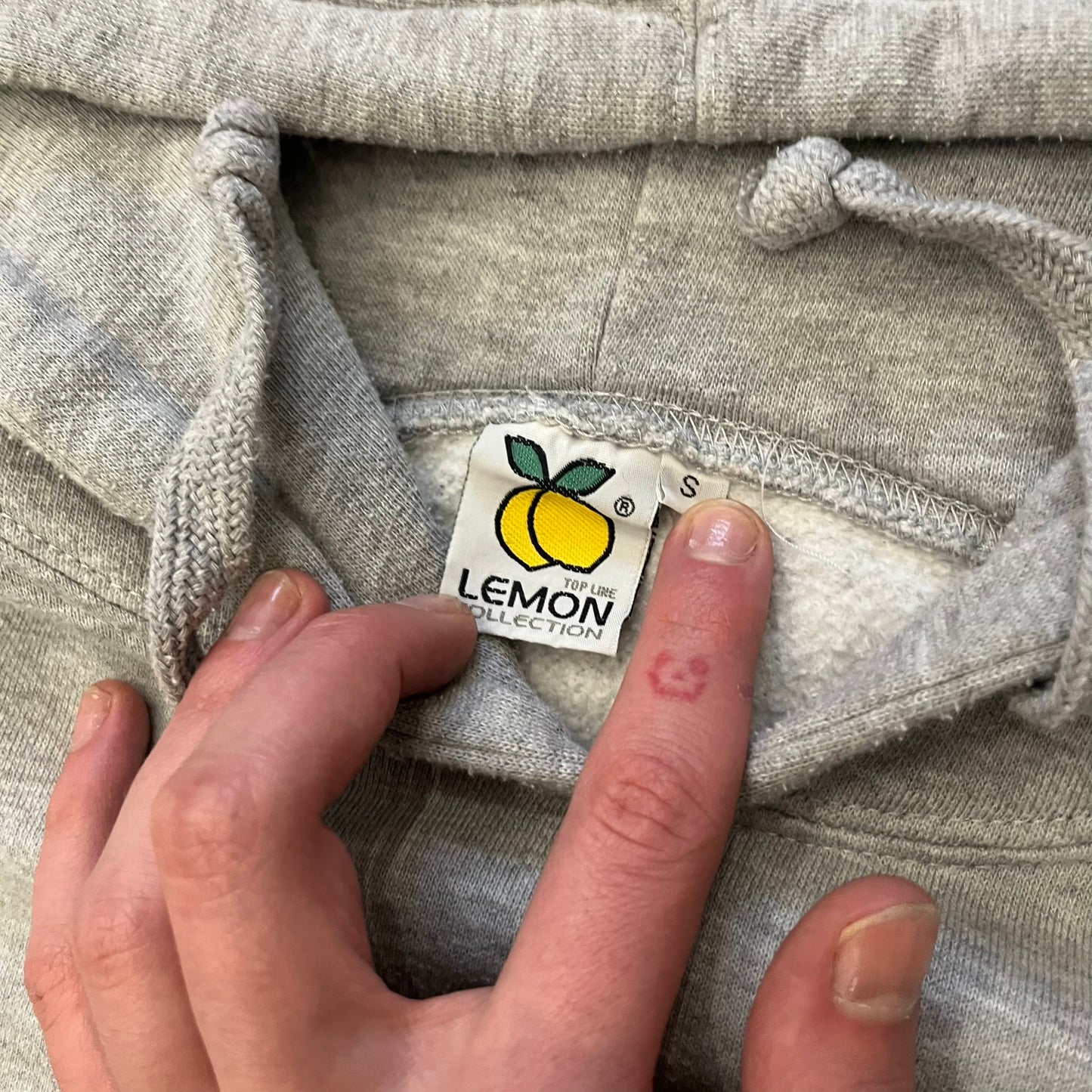 This Adihash “Gives You Speed!” Hoodie features a playful twist on the classic adidas emblem, replacing the trefoil with three marijuana leaves and big Adihash branding. Made from a soft polyester–cotton blend, it offers everyday comfort with a standard pouch pocket and a clean grey finish. Produced on a Lemon Collection blank.