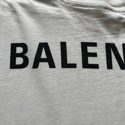 Balenciaga back logo tee from 2018, crafted in Portugal from soft white cotton. Designed with an oversized fit, it features a bold Balenciaga text logo across the upper back. Lower back part is a lot wider than front.