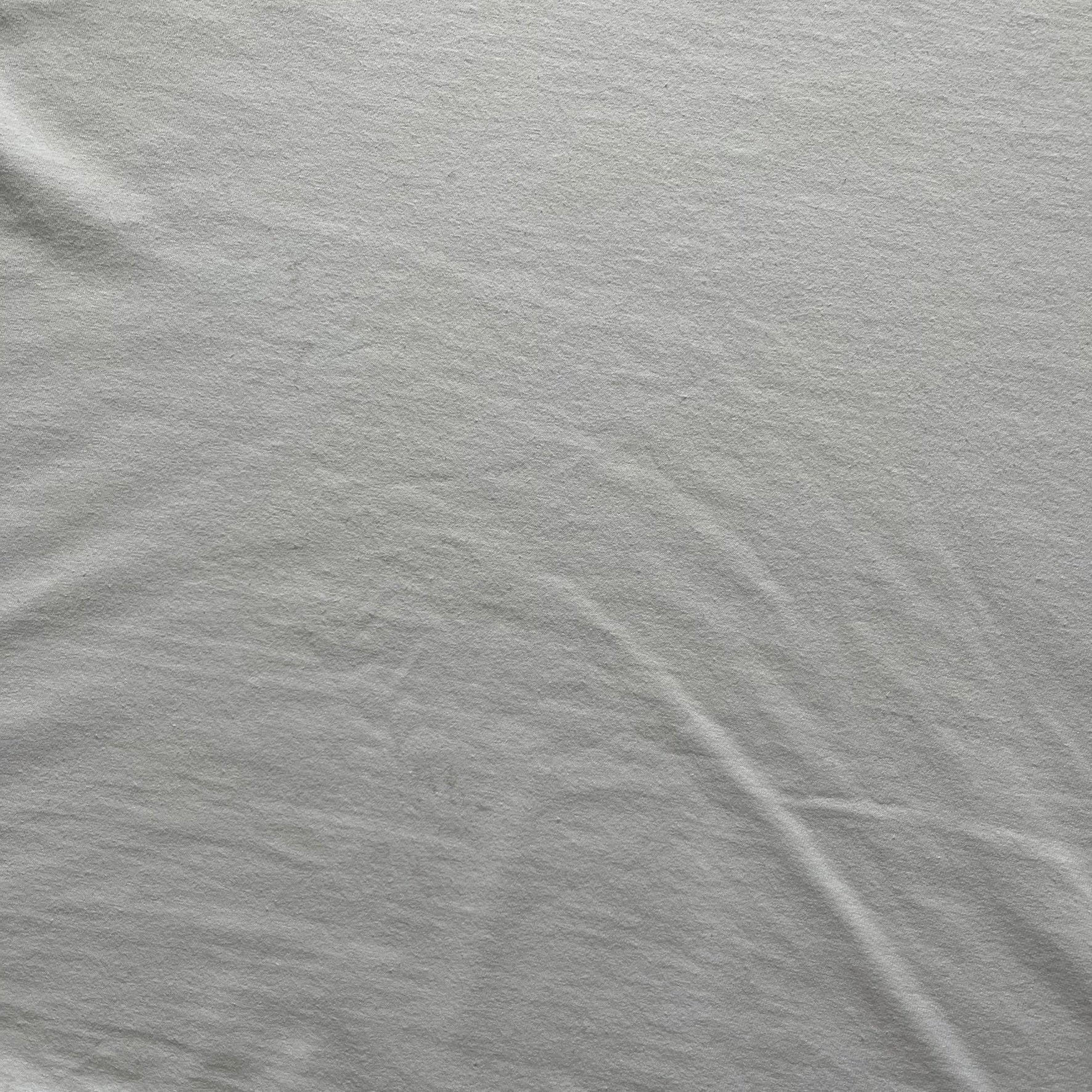 Balenciaga back logo tee from 2018, crafted in Portugal from soft white cotton. Designed with an oversized fit, it features a bold Balenciaga text logo across the upper back. Lower back part is a lot wider than front.