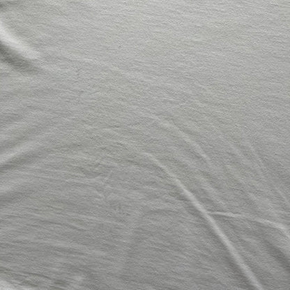 Balenciaga back logo tee from 2018, crafted in Portugal from soft white cotton. Designed with an oversized fit, it features a bold Balenciaga text logo across the upper back. Lower back part is a lot wider than front.