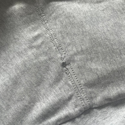 Close-up of a gray fabric with stitching detail