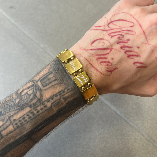 Bazo 1199 "63 OG" Stainless Steel Gold Plated Bracelet is a gold color stainless steel bracelet with thin and smooth beads. The interior is engraved with the 1199 logo and 63OG text.&nbsp;&nbsp;