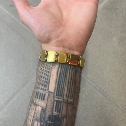 Bazo 1199 "63 OG" Stainless Steel Gold Plated Bracelet is a gold color stainless steel bracelet with thin and smooth beads. The interior is engraved with the 1199 logo and 63OG text.&nbsp;&nbsp;