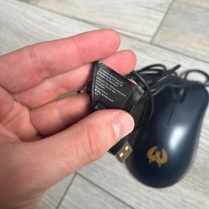 BenQ Zowie EC1-B CS:GO Special Edition Gaming Mouse is a wired ergonomic mouse designed for right-handed users, featuring a PixArt 3360 optical sensor with adjustable DPI settings. The black casing includes a CS:GO Guardian graphic, with a 1000 Hz polling rate, five buttons, and a scroll wheel for precise control. It has a USB connection, 2-meter cable, and a lightweight 94 g construction optimized for palm and claw grip styles.