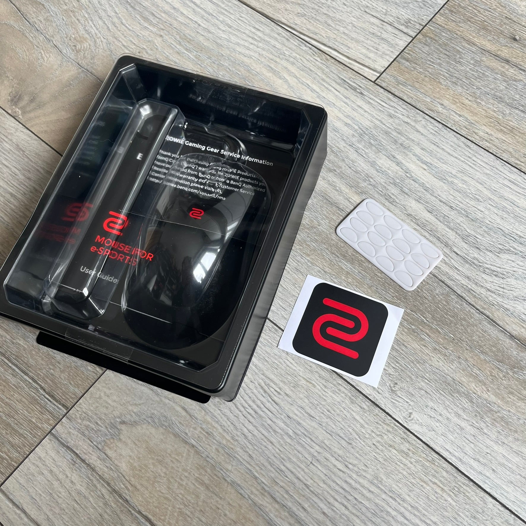 BenQ Zowie EC1-B CS:GO Special Edition Gaming Mouse is a wired ergonomic mouse designed for right-handed users, featuring a PixArt 3360 optical sensor with adjustable DPI settings. The black casing includes a CS:GO Guardian graphic, with a 1000 Hz polling rate, five buttons, and a scroll wheel for precise control. It has a USB connection, 2-meter cable, and a lightweight 94 g construction optimized for palm and claw grip styles.