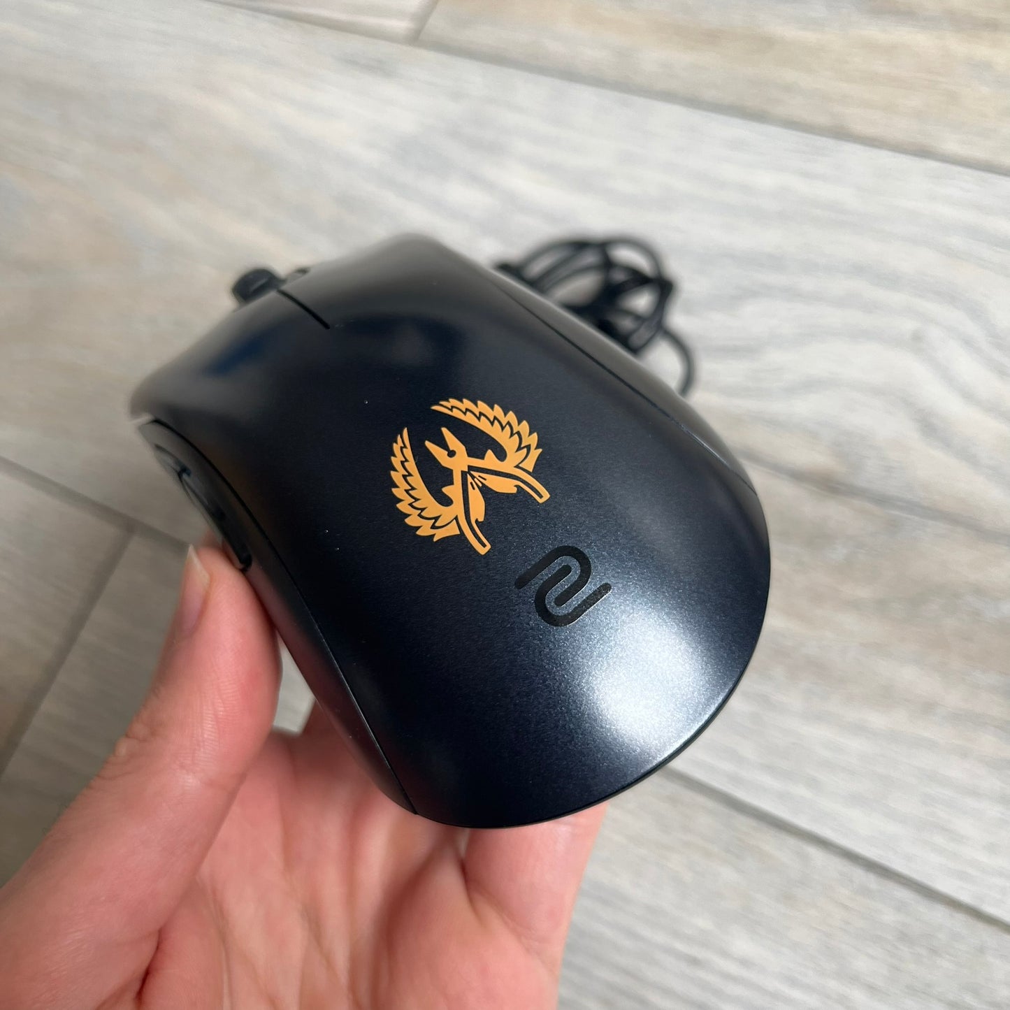BenQ Zowie EC1-B CS:GO Special Edition Gaming Mouse is a wired ergonomic mouse designed for right-handed users, featuring a PixArt 3360 optical sensor with adjustable DPI settings. The black casing includes a CS:GO Guardian graphic, with a 1000 Hz polling rate, five buttons, and a scroll wheel for precise control. It has a USB connection, 2-meter cable, and a lightweight 94 g construction optimized for palm and claw grip styles.