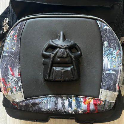 Rare 2007 Bionicle Inika "Toa Nuparu" school backpack made by Grown Up Licenses Limited under The Lego Group. Features a 3D molded Toa Nuparu head on the lower front pocket and a fully printed velcro top compartment with Bionicle figures. Spacious, durable, and reinforced for structure. A standout collectible for any true Bionicle fan.