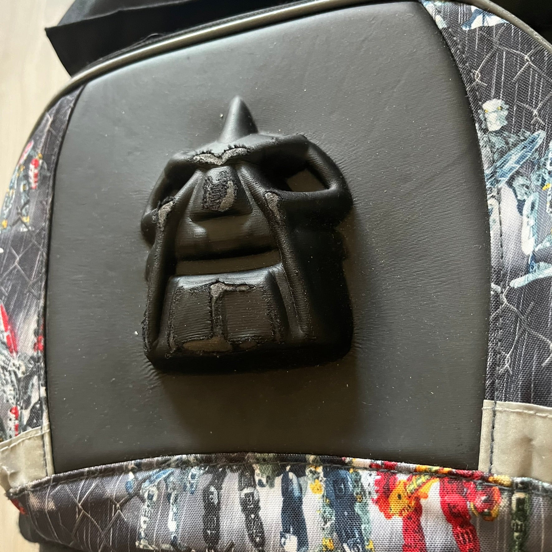 Rare 2007 Bionicle Inika "Toa Nuparu" school backpack made by Grown Up Licenses Limited under The Lego Group. Features a 3D molded Toa Nuparu head on the lower front pocket and a fully printed velcro top compartment with Bionicle figures. Spacious, durable, and reinforced for structure. A standout collectible for any true Bionicle fan.