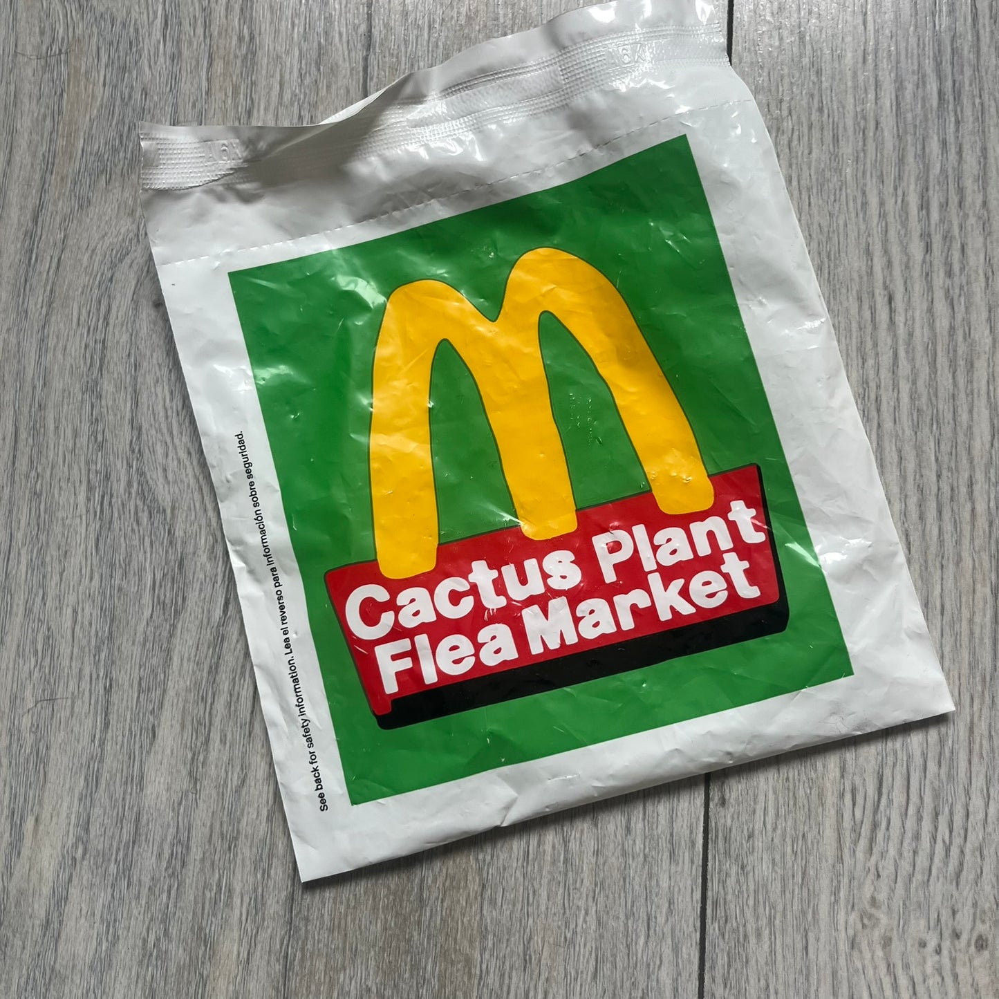 CPFM x McDonald's Birdie The Early Bird Figure from the 2022 collaboration between Cactus Plant Flea Market and McDonald’s. Features the signature yellow Bird character wearing a pruple and orange McDonald’s overalls ,with CPFM’s iconic four-eye design. Released as part of the adult Happy Meal collection in FW22, licensed on the back. Comes with the Foil bag.