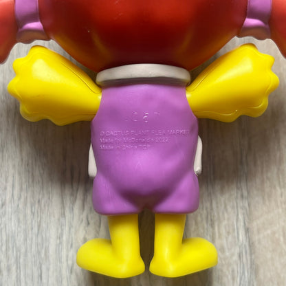 CPFM x McDonald's Birdie The Early Bird Figure from the 2022 collaboration between Cactus Plant Flea Market and McDonald’s. Features the signature yellow Bird character wearing a pruple and orange McDonald’s overalls ,with CPFM’s iconic four-eye design. Released as part of the adult Happy Meal collection in FW22, licensed on the back. Comes with the Foil bag.