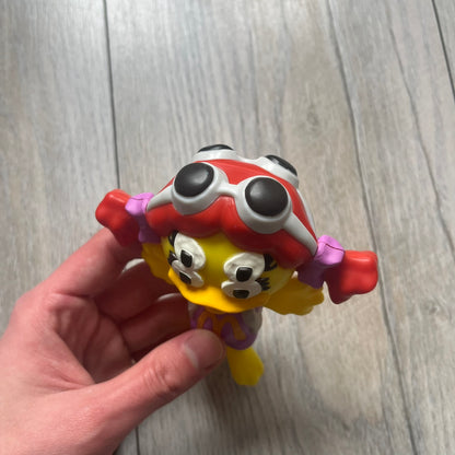CPFM x McDonald's Birdie The Early Bird Figure from the 2022 collaboration between Cactus Plant Flea Market and McDonald’s. Features the signature yellow Bird character wearing a pruple and orange McDonald’s overalls ,with CPFM’s iconic four-eye design. Released as part of the adult Happy Meal collection in FW22, licensed on the back. Comes with the Foil bag.