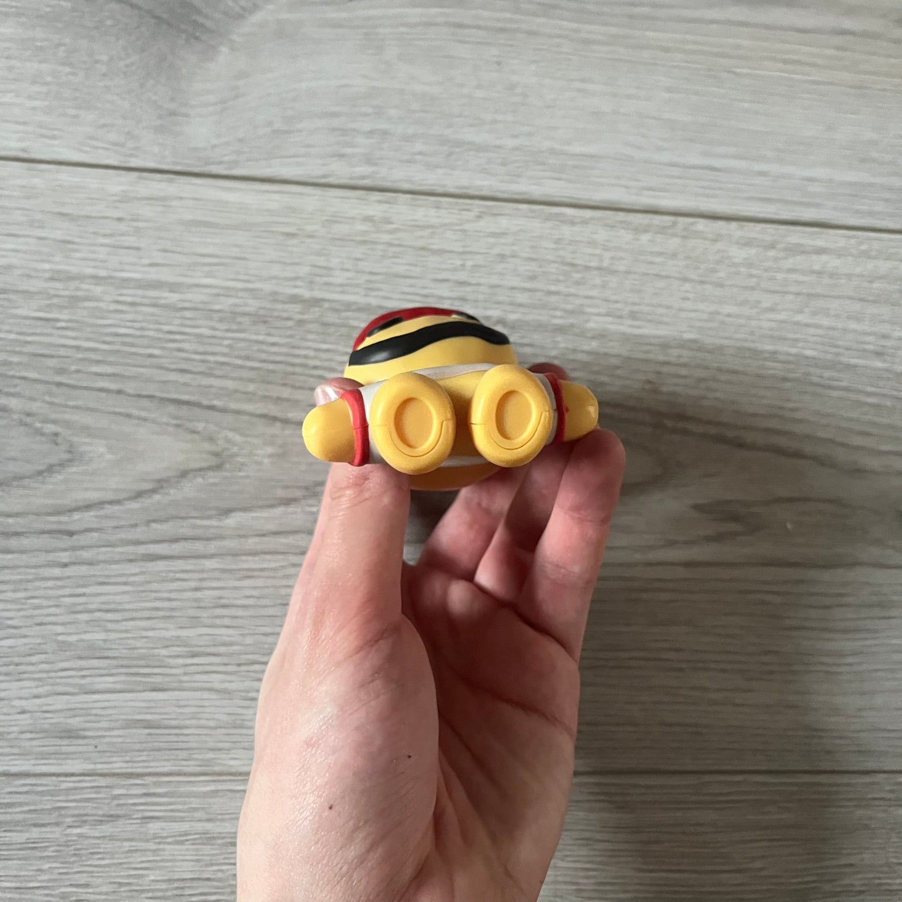 CPFM x McDonald’s Cactus Buddy Figure from the 2022 collaboration between Cactus Plant Flea Market and McDonald’s. Features the signature yellow character wearing a red and white McDonald’s tee with CPFM’s iconic four-eye design. Released as part of the adult Happy Meal collection in FW22, licensed on the back.