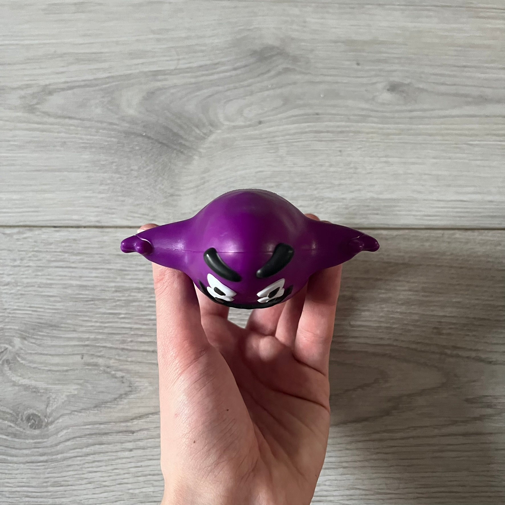 Official CPFM x McDonald’s Grimace collectible from the FW22 drop. The purple figure showcases the McDonald’s icon reimagined with CPFM’s four-eye design. Released October 3rd, 2022, as part of the limited adult Happy Meal collection, licensed on the back.