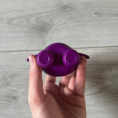 Official CPFM x McDonald’s Grimace collectible from the FW22 drop. The purple figure showcases the McDonald’s icon reimagined with CPFM’s four-eye design. Released October 3rd, 2022, as part of the limited adult Happy Meal collection, licensed on the back.