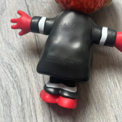 The CPFM x McDonald’s Hamburglar Figure from the FW22 adult Happy Meal drop features the classic character in his striped outfit, red gloves, and green McDonald’s tie, reimagined with CPFM’s four-eye design. Licensed on the back and released October 3rd, 2022.
