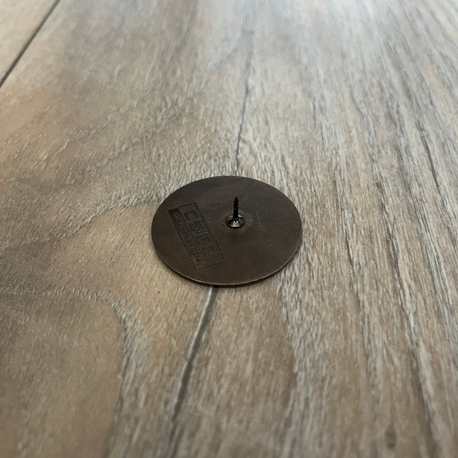 Original physical Counter-Strike: Global Offensive Series 1 Elite Guardian pin, produced as official Valve merchandise. These pins were sold at Valve-sponsored CS:GO Major events and later through the official WeLoveFine store, and originally included a code to unlock a “Genuine” in-game digital pin on a Steam profile. This example comes without the packaging and the in-game code.