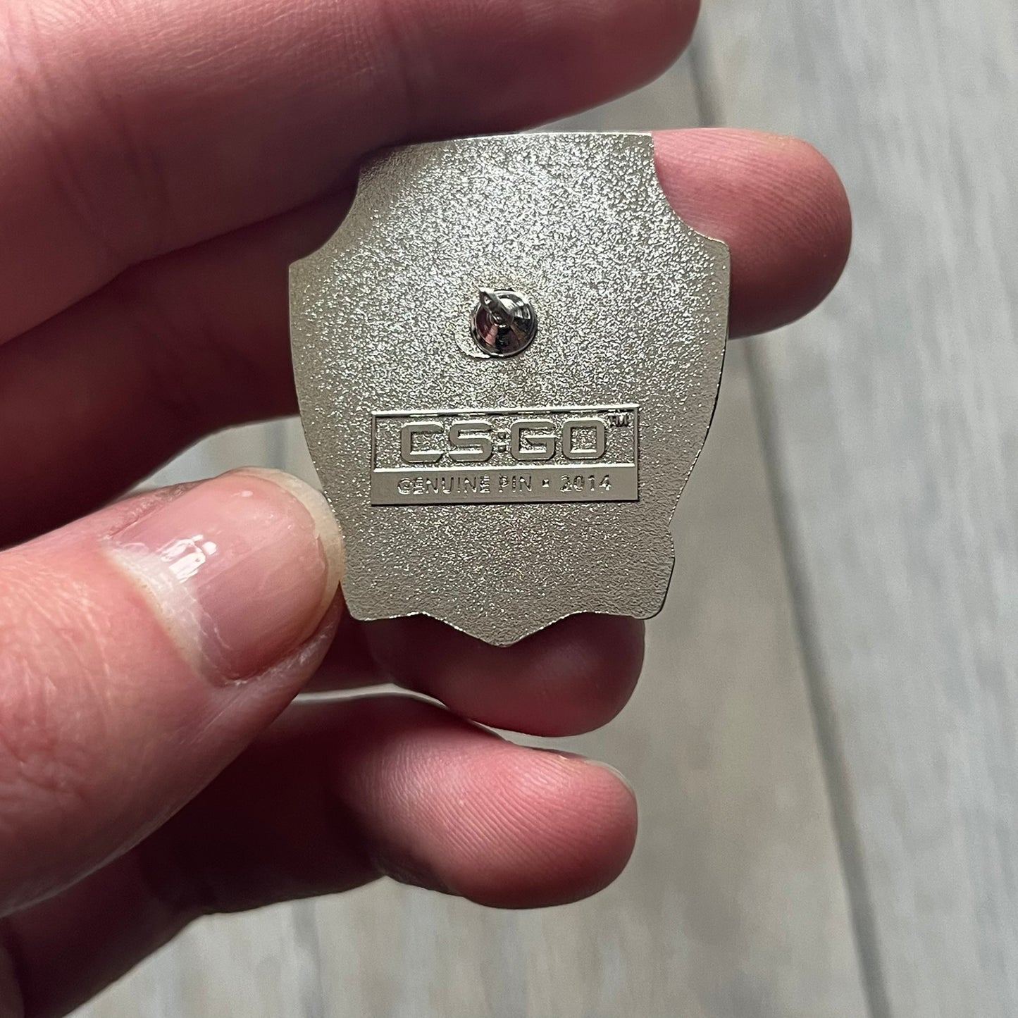 Original physical Counter-Strike: Global Offensive Series 1 Italy pin, produced as official Valve merchandise. These pins were sold at Valve-sponsored CS:GO Major events and later via the official WeLoveFine store, and originally included a code to unlock a “Genuine” Italy pin for the user’s Steam profile. This example comes with the original packaging; the code has been scratched (by me) but remains unused.