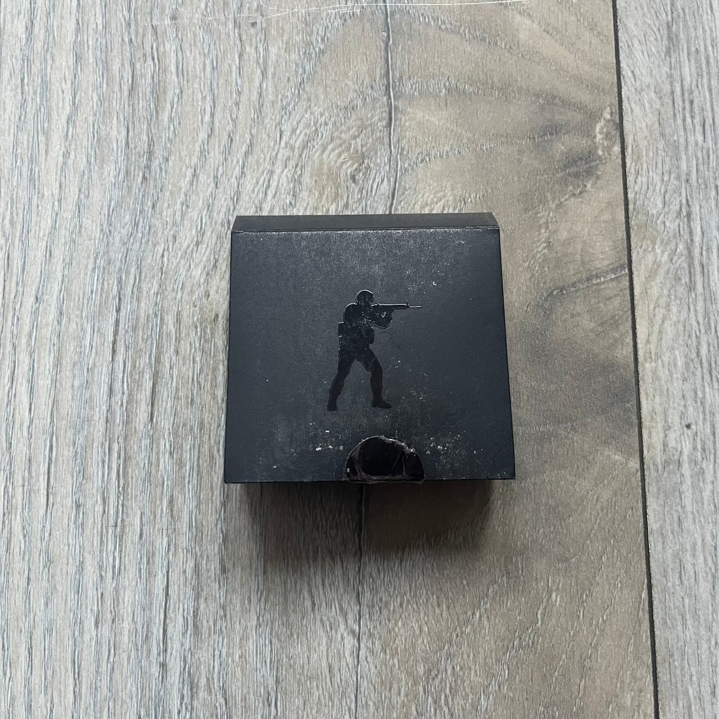 Original physical Counter-Strike: Global Offensive Series 1 Nuke pin, produced as official Valve merchandise. These pins were sold at Valve-sponsored CS:GO Major events and later via the official WeLoveFine store, and originally included a code to unlock a “Genuine” Nuke pin for the user’s Steam profile. This example comes with the original packaging; the code has been scratched (by me) but remains unused.
