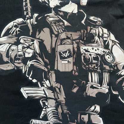 Call of Duty: Black Ops 2018 Black Tee is a black promotional T-shirt with a 2018 Activision Publishing licensed neck tag. The front features a large white and grey character graphic in armor holding a weapon, with the “Call of Duty Black Ops” logo printed above. The print spans most of the front from top to bottom.
