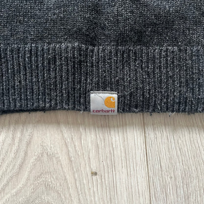  The Carhartt WIP Allen Sweater blends function and refinement in a dark gray wool–nylon knit. Midweight with ribbed details at the neck, cuffs, and hem, it ensures warmth and flexibility. A classic, durable knit that captures the minimal craftsmanship of Carhartt WIP.